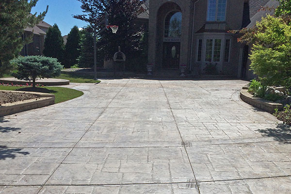 how to seal stamped concrete driveway before 