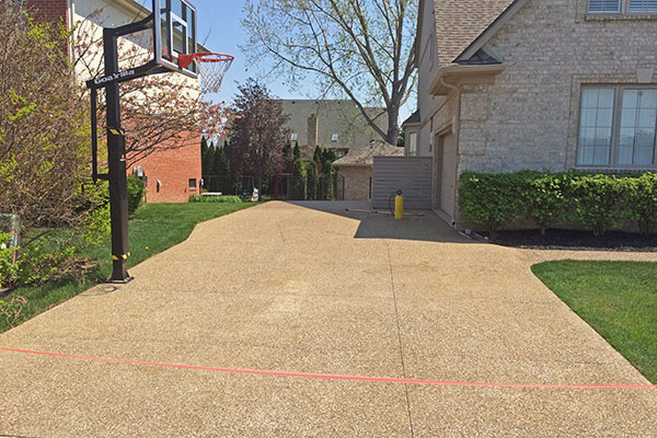 exposed aggregate sealing of a driveway in Macomb , MI