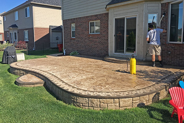 how to seal stamped concrete patio before 