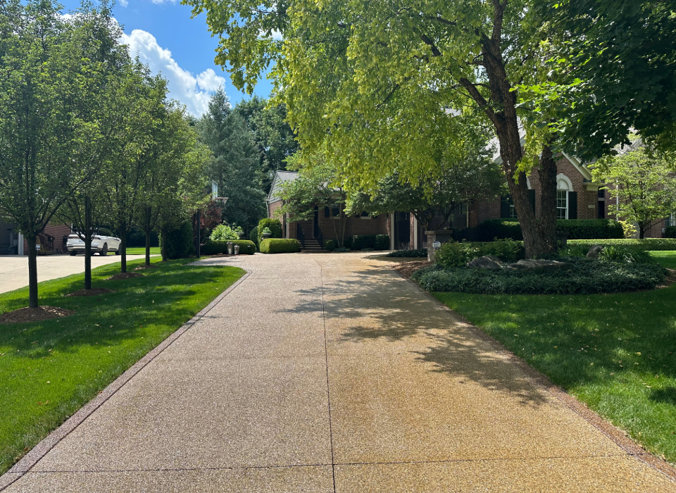 exposed aggregate driveway sealed with browntone